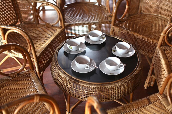 high-angle-shot-tea-set-table-with-chairs